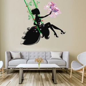 Modern wall sticker featuring a girl on a swing with flowers and butterfly silhouette