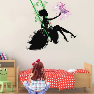 Detailed wall sticker featuring a woman silhouette on a vine swing with colorful butterflies
