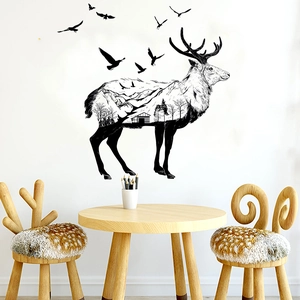 Artistic elk wall sticker with double exposure forest and mountain landscape on a white wall