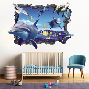 Vue détaillée du sticker mural 3D océan avec dauphins et tortues dans une chambre bébé
