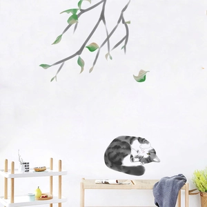 Adhesive wall sticker featuring a realistic sleeping cat on tree branches for home decor