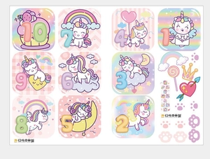 Detail of colorful unicorn numbered stickers 1-10 with rainbows for kids room wall decor
