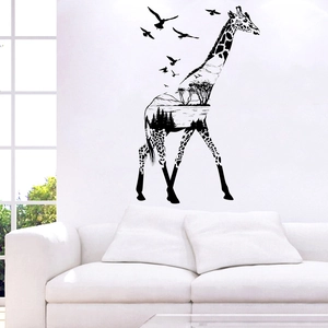 Artistic giraffe wall decal with forest silhouette for modern living room decor