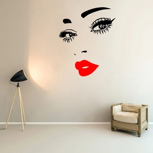 Detailed close-up of fashion beauty wall decal with red lips and long eyelashes design
