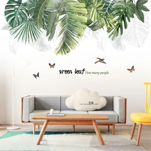 Detail of tropical green leaf wall stickers with birds and butterflies for living room decor