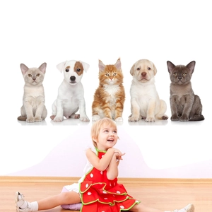 Detailed wall sticker featuring five cute kittens and puppies in a home living room setting