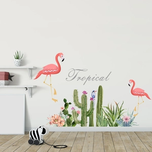 Détail de stickers muraux tropicaux avec flamants roses et plantes de cactus
