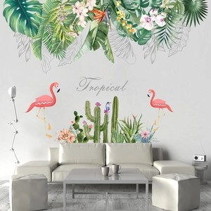 Tropical wall decals with pink flamingos and green cactus for a modern living room