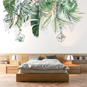 Modern Nordic wall decal with tropical green leaves and geometric pendants for home decor