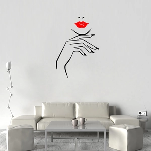 Close-up of minimalist black line art wall sticker with red lips on white living room wall