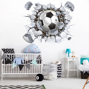 Detail view of 3D cracked wall football sticker in a stylishly decorated kid bedroom