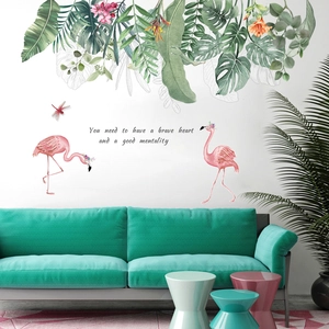 Detail of tropical flamingo wall stickers with green leaves and motivational quote
