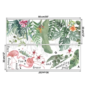 Detailed view of tropical flamingo and green leaf wall stickers with motivational quotes