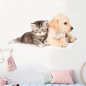Detail showing self-adhesive 3D wall sticker with realistic puppy and kitten in a bedroom