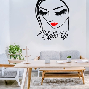 Detail view of red lips wall sticker with Make-Up text for beauty salon decor