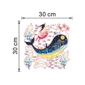 Detail of nautical wall stickers set with blue whale and stars, size 30x30 cm