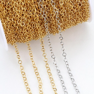 18K gold and silver plated 304 stainless steel O-link chains on white plastic spools
