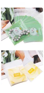 Detail of cartoon self-adhesive plastic bags for jewelry and treats with cat pattern