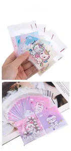 Detailed view of small cartoon self-sealing gift bags used for jewelry and snacks