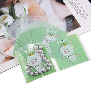 Mint green cartoon cat self-sealing plastic gift bags for jewelry and candy packaging