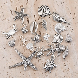 Antique silver ocean themed alloy pendants featuring starfish, turtles and seashells