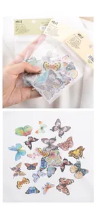 Macro detail of transparent PET butterfly stickers for DIY scrapbooking decoration