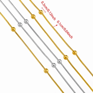 Minimalist stainless steel snake chain necklace with beads in gold and silver finish