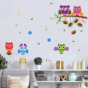 Detailed sheet of cartoon owl wall stickers with American football and sports helmet elements