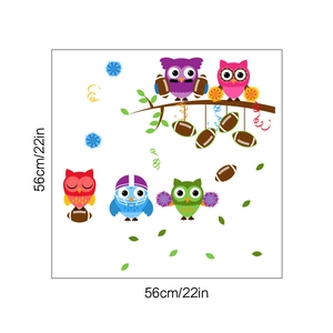 Detail view of cartoon owl wall stickers with football theme elements in 56cm layout