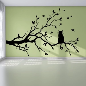 Minimalist black silhouette wall sticker featuring cats on branches and flying birds