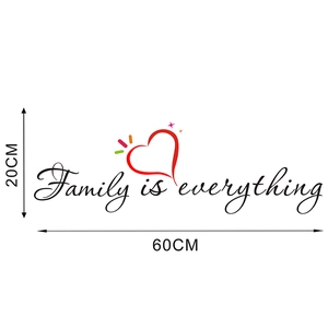 Detail showing Family Is Everything wall decal with red hearts measuring 60cm by 20cm