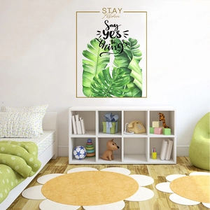 Frameless tropical wall sticker with monstera leaves and Stay Positive quote for kids room
