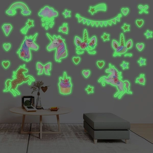 Glow-in-the-dark unicorn wall stickers with stars and rainbow patterns for kids bedroom