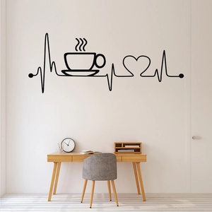 Macro view of black vinyl coffee heartbeat wall decal in a minimalist modern office setup