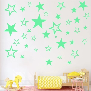 Glow-in-the-dark star wall stickers for kids bedroom in mint green luminous vinyl