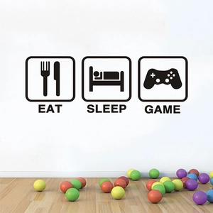 EAT SLEEP GAME wall decal set for kids room decor with icons on white wall