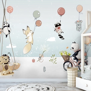 Detailed wall sticker featuring a fox with balloons and panda on bicycle in a nursery