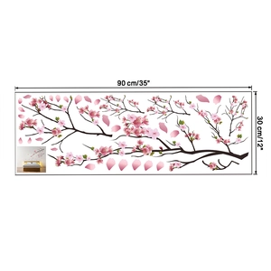 Detail showing pink cherry blossom branch wall decals with dimensions 90cm x 30cm