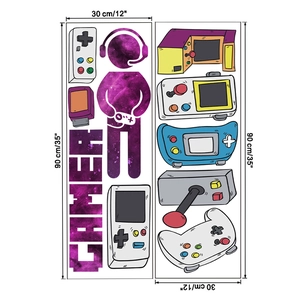 Macro detail of retro game wall stickers set with gamer silhouette and controller motifs