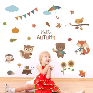 Close-up of Hello Autumn forest animal wall decals in nursery with squirrel and bear