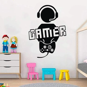 Close-up of black PVC gamer wall sticker with headset player silhouette and gamepad design
