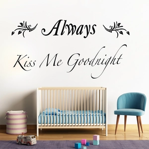 Detailed view of Always Kiss Me Goodnight wall sticker with elegant floral accents on white wall