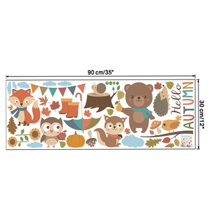 Detailed view of autumn animal wall stickers featuring a fox, bear, and owl motifs
