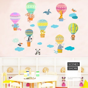 Cartoon animals hot air balloon wall stickers for nursery decor featuring lion and elephant