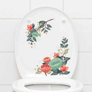 Sticker abattant WC fleurs aquarelle avec décor de fleurs rouges et feuilles vertes