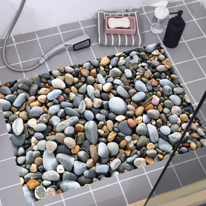 Tapis de bain antidérapant avec motif de galets 3D et texture naturelle réaliste