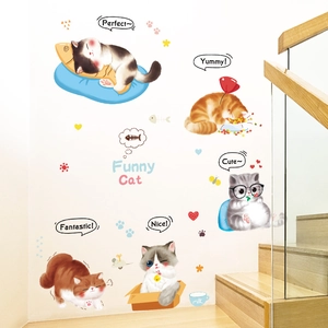 Cartoon cat wall stickers set for home decor with funny cat patterns on a white staircase wall