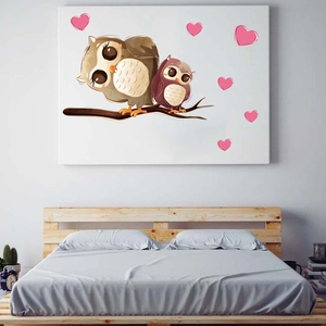 Detailed wall sticker mockup of cartoon owls on a branch with pink hearts above bed