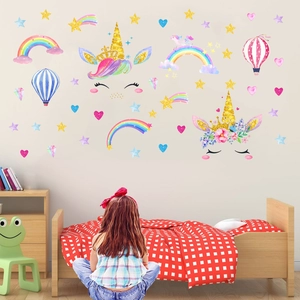 Unicorn and rainbow wall decals for children's bedroom with golden stars and hot air balloons