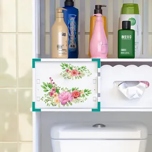 Détail de l'autocollant étanche pour toilettes avec fleurs roses sur armoire blanche